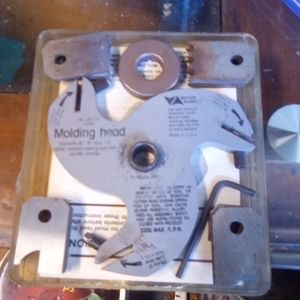 Crown molding cutter head